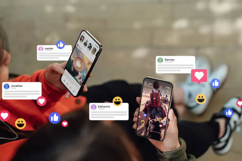 Two people holding smartphones with social media reactions and comments displayed on the screen, showcasing future-proof marketing strategies tailored for Inverness businesses.